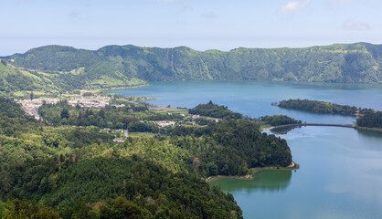 Beautiful view of Sete Cidades twin crater lakes surrounded by lush greenery in Sao Miguel, Azores, Portugal.