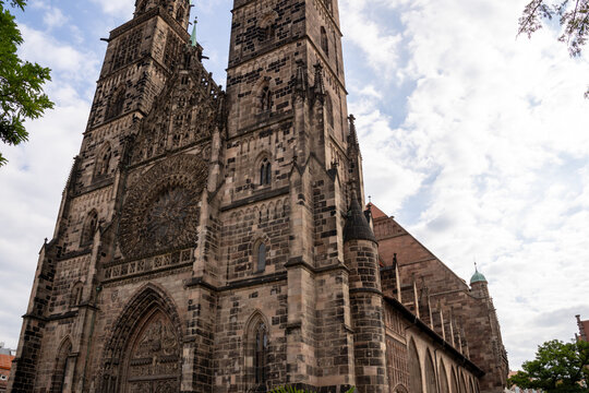 St. Lorenz Church in Nuremberg, Germany, beautifully restored after World War II, featuring stunning stained glass, grand organ, and medieval architecture.