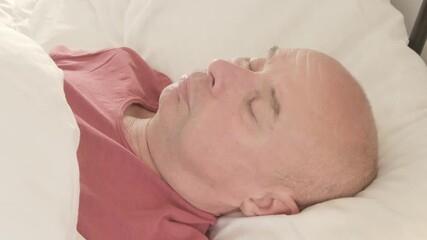 senior man rests deeply, eyes closed and face serene, Nighttime struggles, sleep disruption, anxiety in older adult, quiet moment true rest, reminding healing begins body finally surrenders to sleep