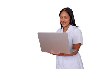 Female doctor in a white coat smiling while using a laptop for online consultation, telehealth, or e-learning