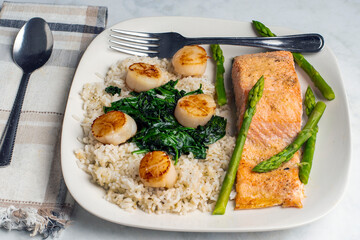 baked salmon   with scallops  and rice