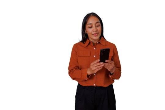 Professional woman smiling, holding smartphone, browsing content, standing against transparent background, using mobile technology - Powered by Adobe