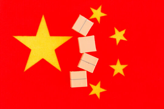 Parcels against the backdrop of the Chinese flag