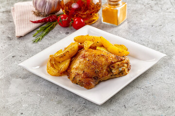 Baked chicken thighs with potatoes