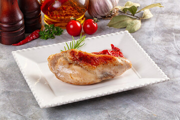 Roasted rabbit leg served rosemary