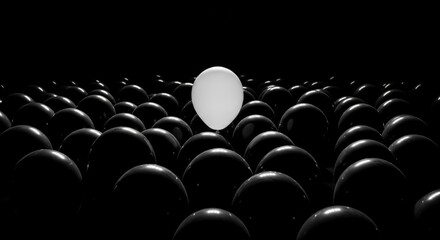 Standing out: A solitary white balloon rises above a sea of black balloons, symbolizing individuality and a departure from conformity. A striking visual metaphor for uniqueness.