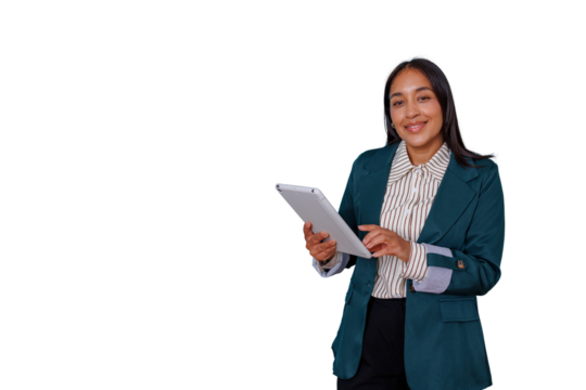 Businesswoman standing, holding and using a tablet, smiling at camera with a transparent background