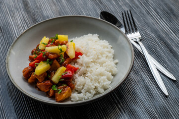 Chicken with pineapple in teriyaki sauce with fried rice. 