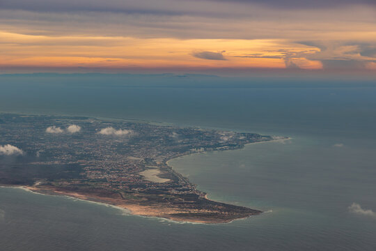 Aerial view of Aruba coastline and Caribbean Sea at sunset