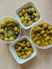 Assorted marinated olives in market display