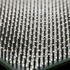 Macro View of Silver Metal Pin Array on the Base of a Computer Processor Chip