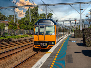 Passenger Train going through Summer Hill train station a suburban Sydney train Station NSW Australia
