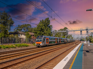 Passenger Train going through Summer Hill train station a suburban Sydney train Station NSW Australia