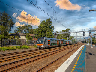 Passenger Train going through Summer Hill train station a suburban Sydney train Station NSW Australia