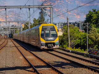 Fototapeta premium Passenger Train going through Summer Hill train station a suburban Sydney train Station NSW Australia