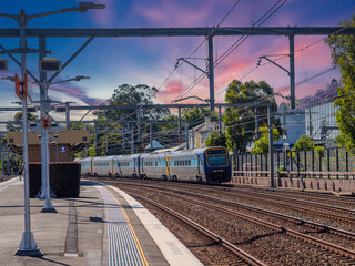 Passenger Train going through Summer Hill train station a suburban Sydney train Station NSW Australia