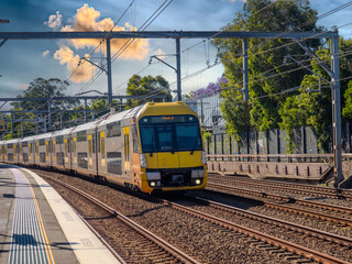 Passenger Train going through Summer Hill train station a suburban Sydney train Station NSW Australia