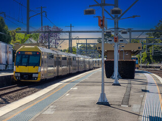 Passenger Train going through Summer Hill train station a suburban Sydney train Station NSW Australia