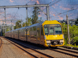 Obraz premium Passenger Train going through Summer Hill train station a suburban Sydney train Station NSW Australia