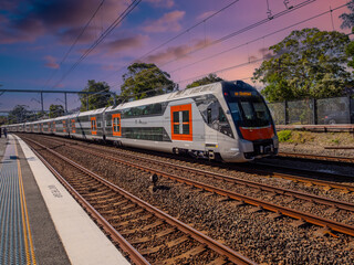 Fototapeta premium Passenger Train going through Summer Hill train station a suburban Sydney train Station NSW Australia