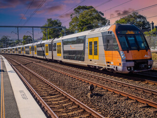 Naklejka premium Passenger Train going through Summer Hill train station a suburban Sydney train Station NSW Australia