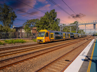 Passenger Train going through Summer Hill train station a suburban Sydney train Station NSW Australia