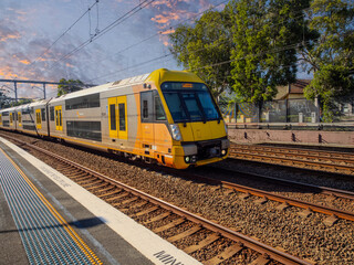 Passenger Train going through Summer Hill train station a suburban Sydney train Station NSW Australia