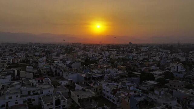 Aerial shot of a sunset in Dehradun city in Uttarakhand, India. Beautiful Indian city.