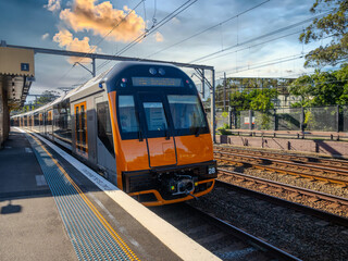 Naklejka premium Passenger Train going through Summer Hill train station a suburban Sydney train Station NSW Australia