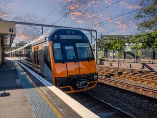 Naklejka premium Passenger Train going through Summer Hill train station a suburban Sydney train Station NSW Australia