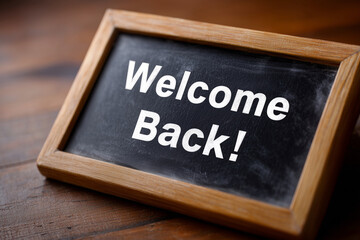 Obraz premium A black chalkboard with the words 