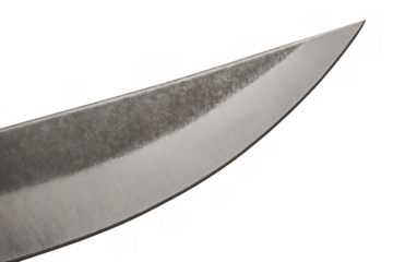 Stainless steel knife blade close-up showing a sharp edge and pointed tip, isolated with a transparent background