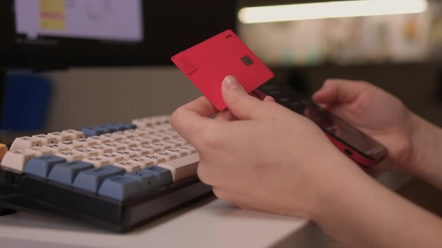Hidden transaction amid dim lighting, Suspicious handoff between devices under low light, Scene depicting covert credit card transfer warning about online fraud risks