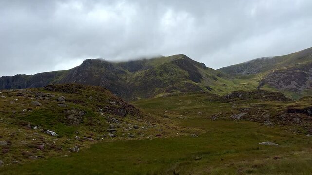Timelapse of Cwm Idwal Valley Mountain Footpath to Llyn Idwal Lake in a Rainy Day, Snowdonia National Park, Bethesda, Wales, United Kingdom