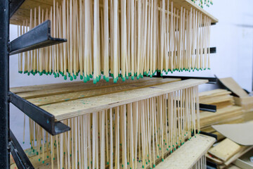 Matches are the product of a large modern factory.