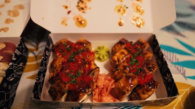 Spicy sushi closeup, Detailed image of spicy seared sushi with glaze and crispy toppings on takeout