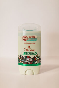 Men's Old Spice Deodorant Stick Lumbersnack Scented for a seasonal winter christmas holiday scent in beige background
