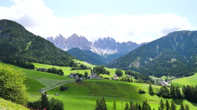 Stunning green valley scene, St Magdalena, Val di Funes, Dolomites, Italy