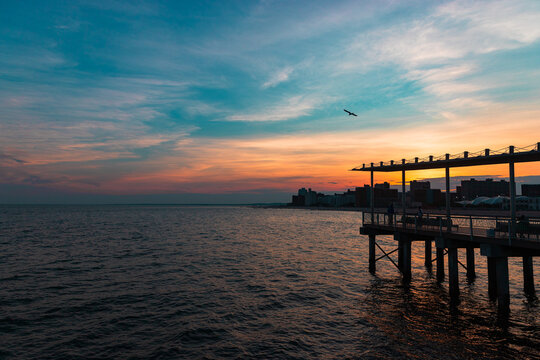 Sunset at the pier - Powered by Adobe