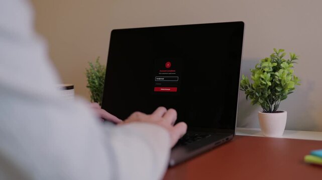 Middle Aged Executive Man Working From Home Falls Victim to Spear Phishing Ransomware Attack - Common Cybersecurity Scenario Concept