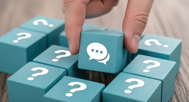 Hand Placing Chat Icon Block Among Question Mark Blocks Decision Making Concept