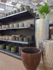 Fototapeta premium Many ceramic pots in flower shop
