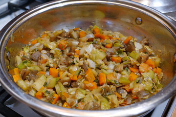 Vegetable stew includes: eggplant, zucchini, cucumber, carrot,  pepper, onion