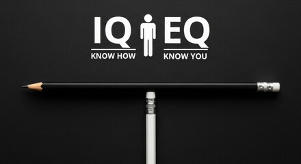 Conceptual illustration of IQ and EQ with pencil and text on black background  