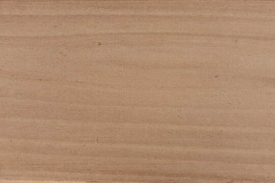 Gros plan sur la texture d'une planche de bois.