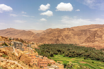 View over the Draa Valley oasis with palm trees and desert mountains near Zagora in southern Morocco
