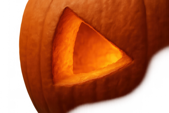 Carved pumpkin with a triangular hole emitting an orange glow, visualizing halloween holiday and traditional autumn concepts