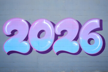 Colorful bubbly graffiti art displaying the year 2026 on a concrete wall