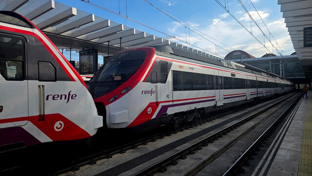 MADRD, SPAIN - OCTOBER, 23, 2025. Chamartin train station in madrid with renfe trains under clear blue sky