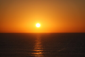 Sunset. Sunrise. Golden waves.